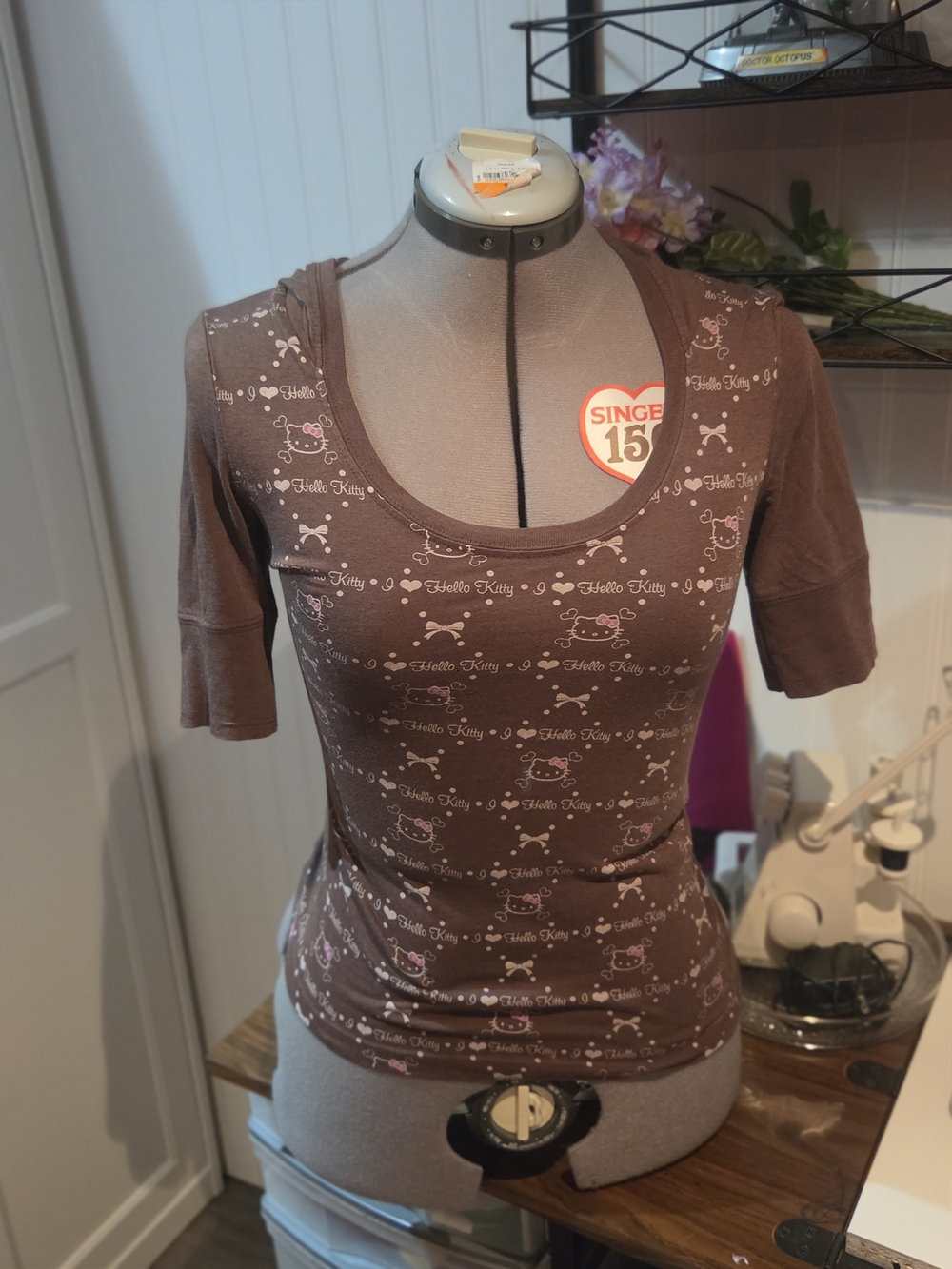 Hello Kitty Brown Short Sleeve Scoop Neck Top with Pink Accents